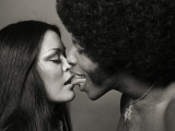 Kathy Silva & Sly Stone, The Kiss, LA, 1974. by NORMAN SEEFF
