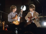 John Lennon and George Harrison, London, 1966. by ROBERT  WHITAKER