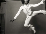  Sly Stone, Leaping Sly, Los Angeles, 1974. by NORMAN SEEFF